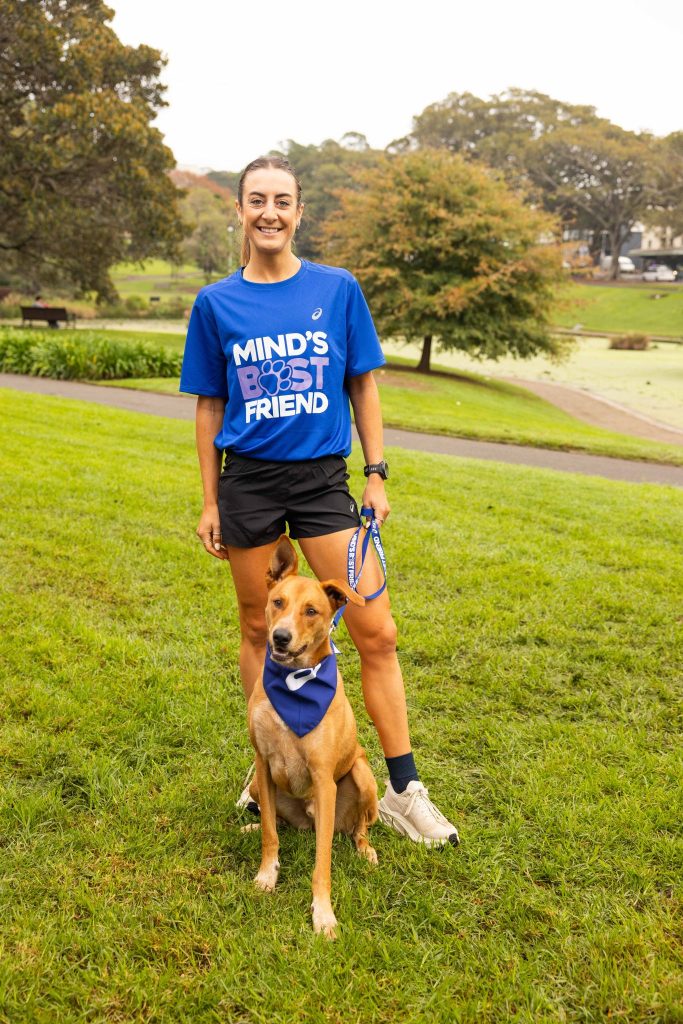 Person with dog symbolizing pet-friendly in creative marketing for emotional connection